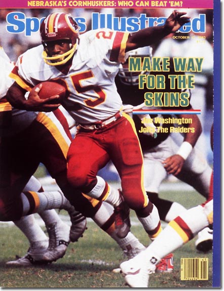 So since I couldn't find a photo of our last victory against the Chiefs, I thought I would post an image of Joe Washington from 1983 slipping past tacklers during a season where the Redskins scored more points than anyone in league history.  Does this make us feel better or worse? 